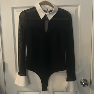 Black mesh bodysuit. White collar